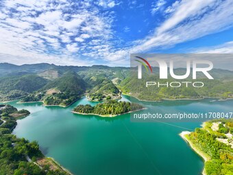 An aerial photo shows the scenery of Mingyue Lake in Chongqing, China, on October 25, 2024. (