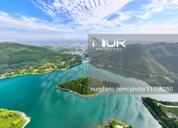 An aerial photo shows the scenery of Mingyue Lake in Chongqing, China, on October 25, 2024. 