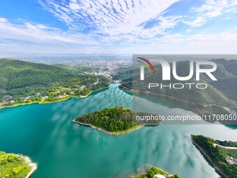 An aerial photo shows the scenery of Mingyue Lake in Chongqing, China, on October 25, 2024. (