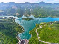 An aerial photo shows the scenery of Mingyue Lake in Chongqing, China, on October 25, 2024. (