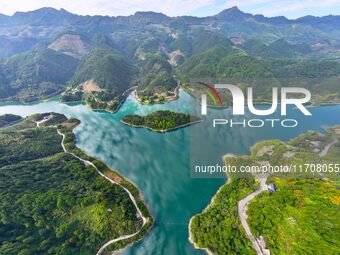 An aerial photo shows the scenery of Mingyue Lake in Chongqing, China, on October 25, 2024. (