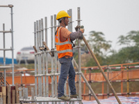 Workers work on the Hongze Lake water conservancy project in Suqian, Jiangsu province, China, on October 26, 2024. (