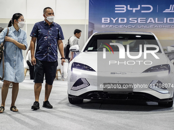 Visitors inspect a BYD SEAL electric car at the Bangkok EV Expo 2024 in Bangkok, Thailand, on October 26, 2024. The Bangkok EV Expo 2024 sho...