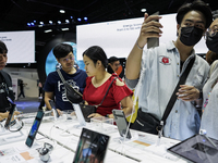 Visitors inspect Samsung smartphones at Thailand Mobile Expo 2024 in Bangkok, Thailand, on October 26, 2024. The expo showcases the newest s...