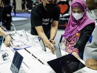 Visitors inspect Samsung smartphones at Thailand Mobile Expo 2024 in Bangkok, Thailand, on October 26, 2024. The expo showcases the newest s...