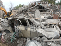 A car is damaged by an overnight Russian attack in the Novokadatskyi district of Dnipro, Ukraine, on October 25, 2024. NO USE RUSSIA. NO USE...