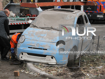 A car is damaged by an overnight Russian attack in the Novokadatskyi district of Dnipro, Ukraine, on October 25, 2024. NO USE RUSSIA. NO USE...