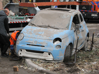 A car is damaged by an overnight Russian attack in the Novokadatskyi district of Dnipro, Ukraine, on October 25, 2024. NO USE RUSSIA. NO USE...