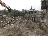 Rescuers work at the scene of an overnight Russian attack in the Novokadatskyi district of Dnipro, Ukraine, on October 25, 2024. NO USE RUSS...