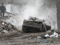 A car is damaged by an overnight Russian attack in the Novokadatskyi district of Dnipro, Ukraine, on October 25, 2024. NO USE RUSSIA. NO USE...