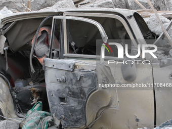 A car is damaged by an overnight Russian attack in the Novokadatskyi district of Dnipro, Ukraine, on October 25, 2024. NO USE RUSSIA. NO USE...