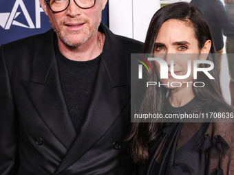 Paul Bettany and wife Jennifer Connelly arrive at the 2024 AFI Fest - World Premiere Screening Of Sony Pictures' 'Here' held at the TCL Chin...