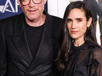 Paul Bettany and wife Jennifer Connelly arrive at the 2024 AFI Fest - World Premiere Screening Of Sony Pictures' 'Here' held at the TCL Chin...