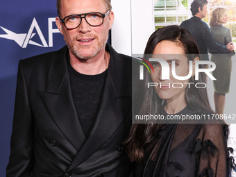 Paul Bettany and wife Jennifer Connelly arrive at the 2024 AFI Fest - World Premiere Screening Of Sony Pictures' 'Here' held at the TCL Chin...