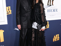 Paul Bettany and wife Jennifer Connelly arrive at the 2024 AFI Fest - World Premiere Screening Of Sony Pictures' 'Here' held at the TCL Chin...