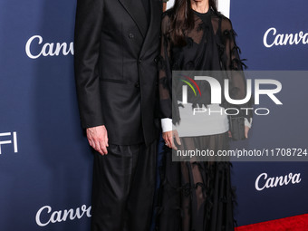 Paul Bettany and wife Jennifer Connelly arrive at the 2024 AFI Fest - World Premiere Screening Of Sony Pictures' 'Here' held at the TCL Chin...