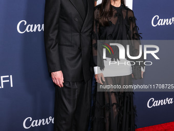 Paul Bettany and wife Jennifer Connelly arrive at the 2024 AFI Fest - World Premiere Screening Of Sony Pictures' 'Here' held at the TCL Chin...