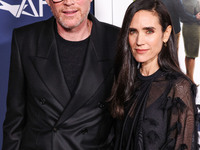 Paul Bettany and wife Jennifer Connelly arrive at the 2024 AFI Fest - World Premiere Screening Of Sony Pictures' 'Here' held at the TCL Chin...