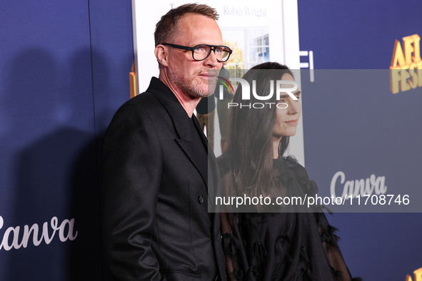 Paul Bettany and wife Jennifer Connelly arrive at the 2024 AFI Fest - World Premiere Screening Of Sony Pictures' 'Here' held at the TCL Chin...