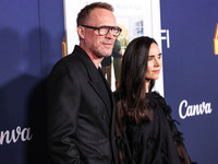 Paul Bettany and wife Jennifer Connelly arrive at the 2024 AFI Fest - World Premiere Screening Of Sony Pictures' 'Here' held at the TCL Chin...