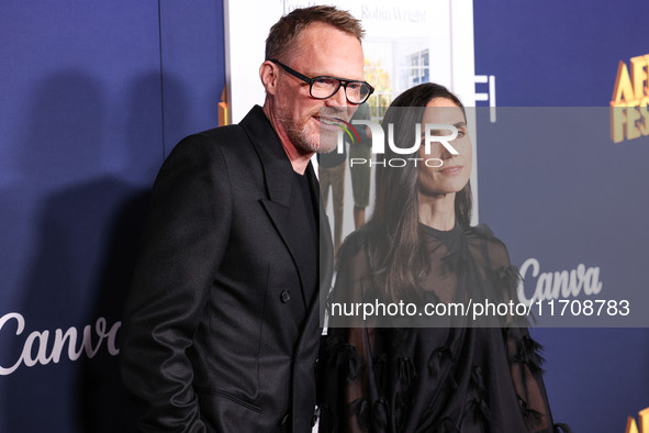 Paul Bettany and wife Jennifer Connelly arrive at the 2024 AFI Fest - World Premiere Screening Of Sony Pictures' 'Here' held at the TCL Chin...