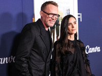 Paul Bettany and wife Jennifer Connelly arrive at the 2024 AFI Fest - World Premiere Screening Of Sony Pictures' 'Here' held at the TCL Chin...