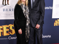 Sandra Silvestri and Alan Silvestri arrive at the 2024 AFI Fest - World Premiere Screening Of Sony Pictures' 'Here' held at the TCL Chinese...