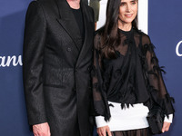 Paul Bettany and wife Jennifer Connelly arrive at the 2024 AFI Fest - World Premiere Screening Of Sony Pictures' 'Here' held at the TCL Chin...