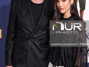 Paul Bettany and wife Jennifer Connelly arrive at the 2024 AFI Fest - World Premiere Screening Of Sony Pictures' 'Here' held at the TCL Chin...