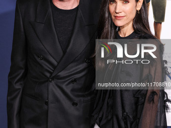 Paul Bettany and wife Jennifer Connelly arrive at the 2024 AFI Fest - World Premiere Screening Of Sony Pictures' 'Here' held at the TCL Chin...