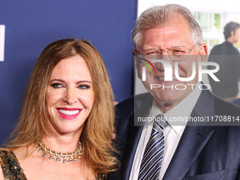 Leslie Zemeckis and husband Robert Zemeckis arrive at the 2024 AFI Fest - World Premiere Screening Of Sony Pictures' 'Here' held at the TCL...