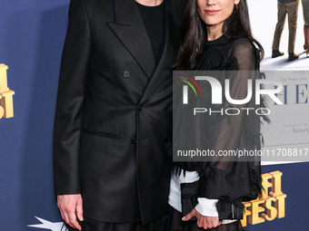 Paul Bettany and wife Jennifer Connelly arrive at the 2024 AFI Fest - World Premiere Screening Of Sony Pictures' 'Here' held at the TCL Chin...