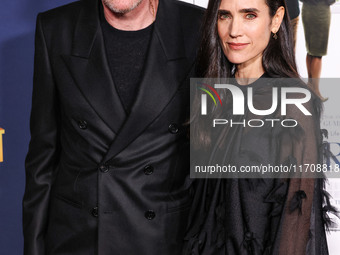 Paul Bettany and wife Jennifer Connelly arrive at the 2024 AFI Fest - World Premiere Screening Of Sony Pictures' 'Here' held at the TCL Chin...