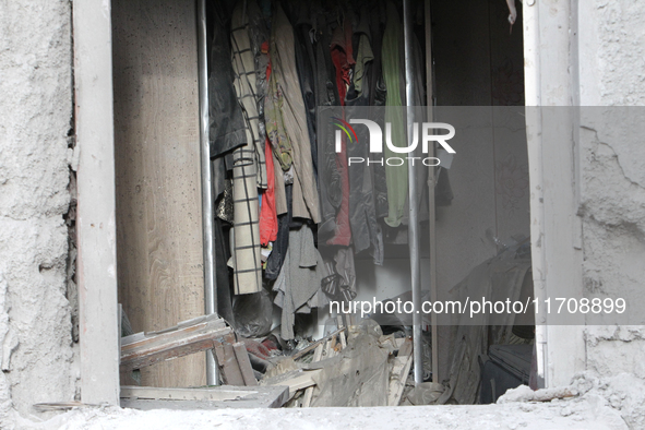 A wardrobe is inside a residential building damaged by an overnight Russian attack in the Novokadatskyi district of Dnipro, Ukraine, on Octo...