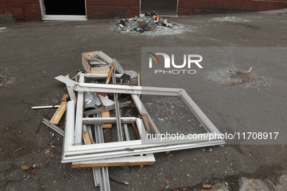 In Dnipro, Ukraine, on October 26, 2024, window frames are piled on the ground after a Russian strike on central Dnipro, east-central Ukrain...