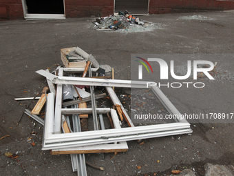 In Dnipro, Ukraine, on October 26, 2024, window frames are piled on the ground after a Russian strike on central Dnipro, east-central Ukrain...