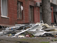 In Dnipro, Ukraine, on October 26, 2024, window frames are piled on the ground after a Russian strike on central Dnipro, east-central Ukrain...