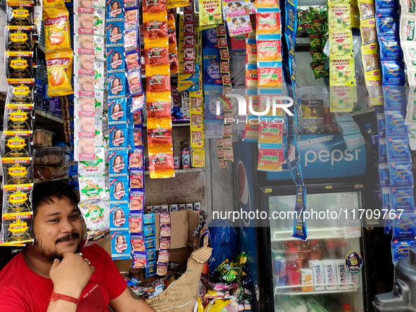 A shopkeeper sells Gutka and tobacco-added pan masala in a roadside shop in Kolkata, India, on October 26, 2024. A notification issued by th...