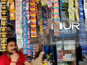 A shopkeeper sells Gutka and tobacco-added pan masala in a roadside shop in Kolkata, India, on October 26, 2024. A notification issued by th...