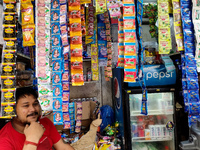 A shopkeeper sells Gutka and tobacco-added pan masala in a roadside shop in Kolkata, India, on October 26, 2024. A notification issued by th...