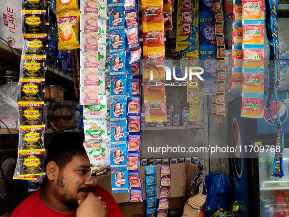 A shopkeeper sells Gutka and tobacco-added pan masala in a roadside shop in Kolkata, India, on October 26, 2024. A notification issued by th...