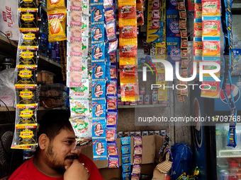 A shopkeeper sells Gutka and tobacco-added pan masala in a roadside shop in Kolkata, India, on October 26, 2024. A notification issued by th...