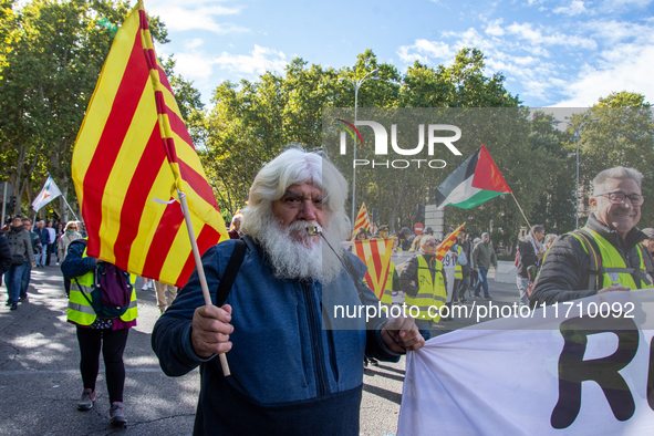 Thousands of people from all over Spain take part in a national demonstration in defense of the public pension system in Madrid, Spain, on O...