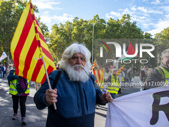 Thousands of people from all over Spain take part in a national demonstration in defense of the public pension system in Madrid, Spain, on O...