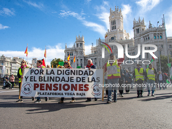 Thousands of people from all over Spain take part in a national demonstration in defense of the public pension system in Madrid, Spain, on O...