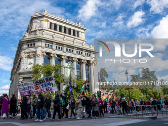 Thousands of people from all over Spain take part in a national demonstration in defense of the public pension system in Madrid, Spain, on O...