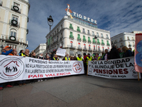 Thousands of people from all over Spain take part in a national demonstration in defense of the public pension system in Madrid, Spain, on O...