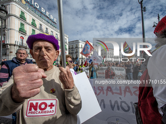 Thousands of people from all over Spain take part in a national demonstration in defense of the public pension system in Madrid, Spain, on O...