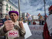 Thousands of people from all over Spain take part in a national demonstration in defense of the public pension system in Madrid, Spain, on O...