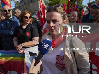 Gigia Bucci, General Secretary of CGIL Puglia, speaks at a rally advocating for world peace in Bari, Italy, on October 26, 2024. Thousands o...